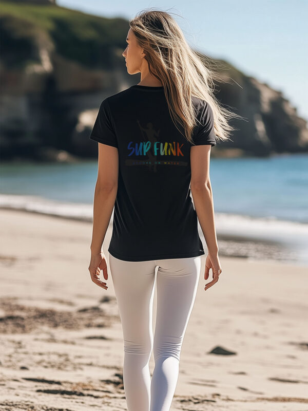 Back view of women's Black regular fit T-Shirt made from 100% Organic Cotton with a large multi coloured SUP Funk logo across the back over dark paddleboard woman motif silhouette