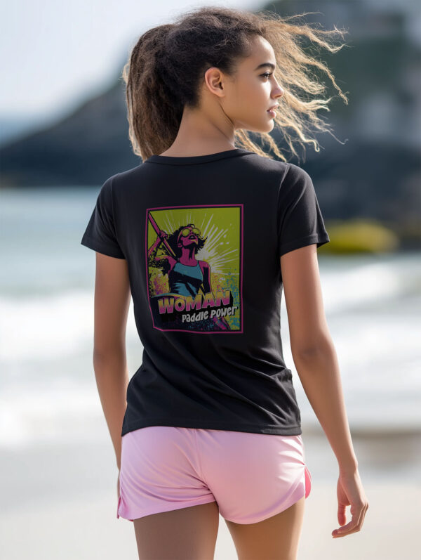 Back view of women's Black regular fit T-Shirt made from 100% Organic Cotton with a large vibrant pink and lime green comic style print with the words Woman Paddle Power.