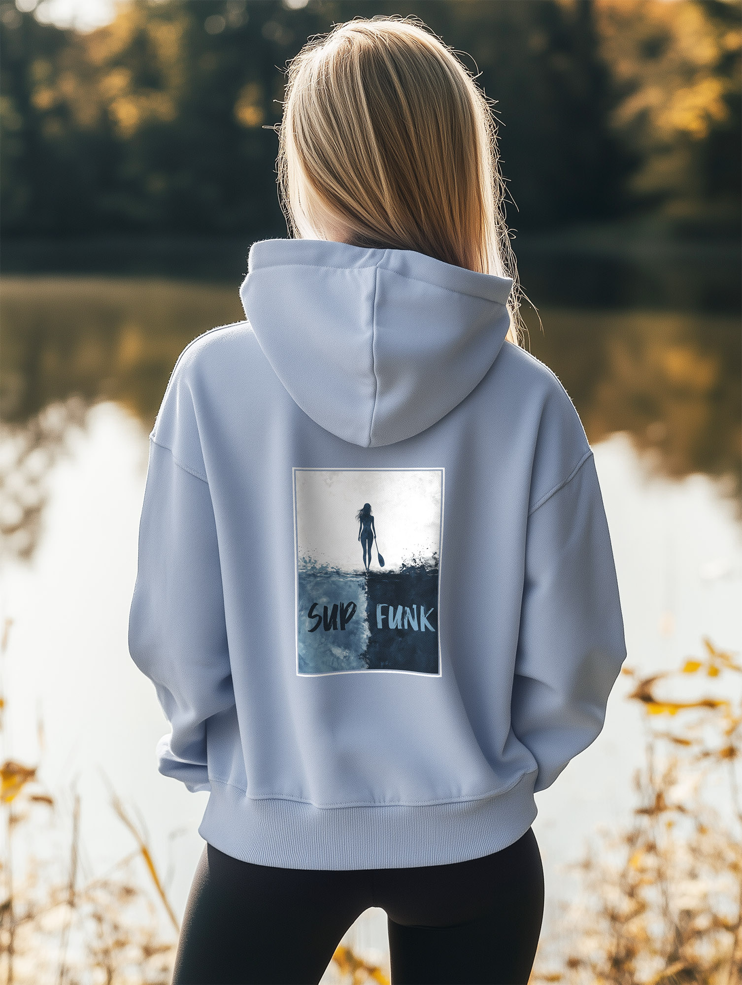 Women's Serene Blue regular fit hoodie made from 85% Organic Cotton, 15% recycled polyester with a large abstract print on the back in blues and woman silhouette and Sup Funk in matching colours. The hoodie is finished off with Vibrant blues SUP Funk logo on the front left chest.