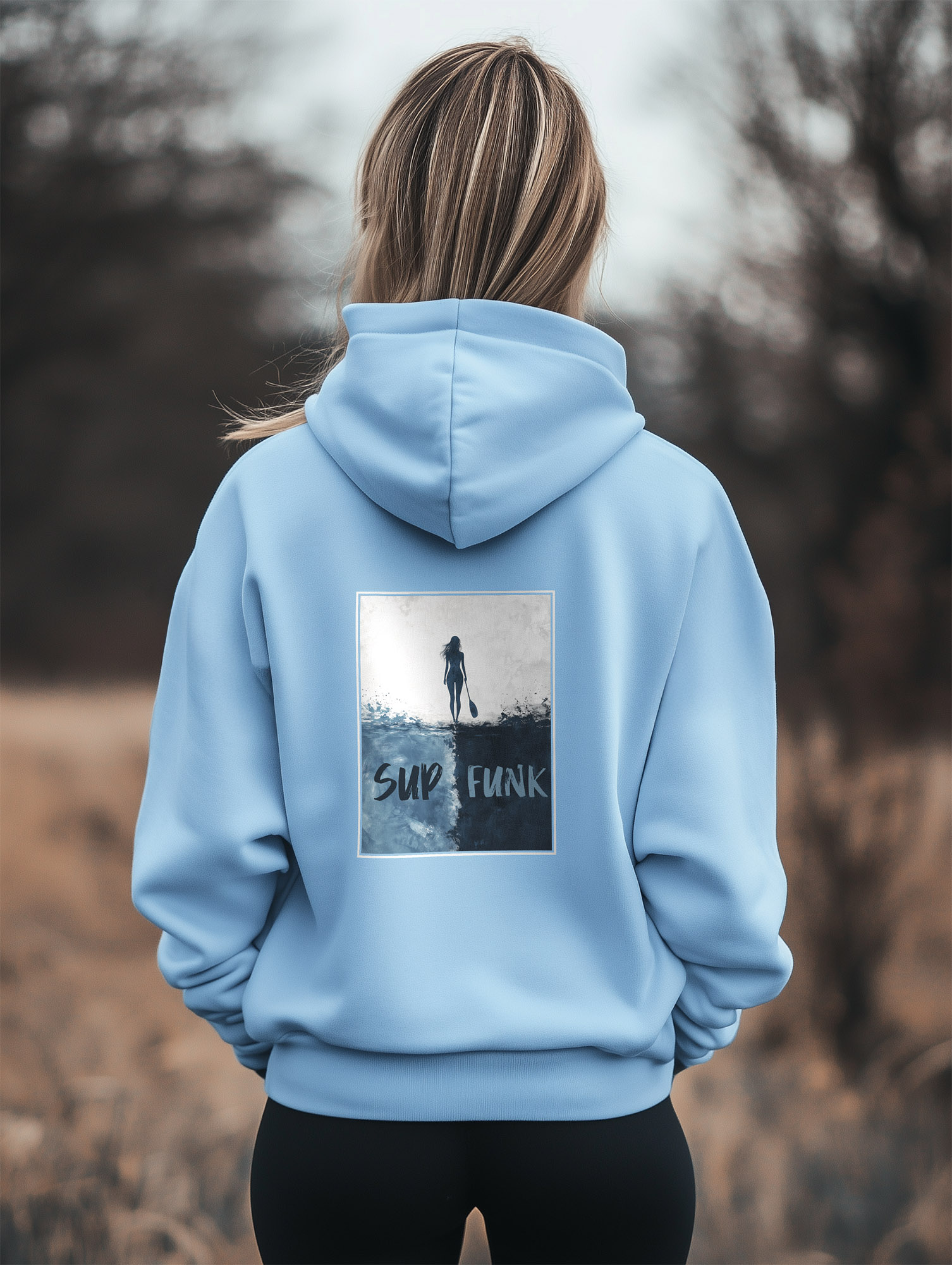 Women's Blue Soul regular fit hoodie made from 85% Organic Cotton, 15% recycled polyester with a large abstract print on the back in blues and woman silhouette and Sup Funk in matching colours. The hoodie is finished off with Vibrant blues SUP Funk logo on the front left chest.