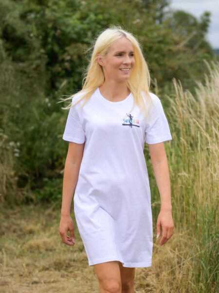 Model wearing a white Groove on water T-Shirt dress by SUP Funk