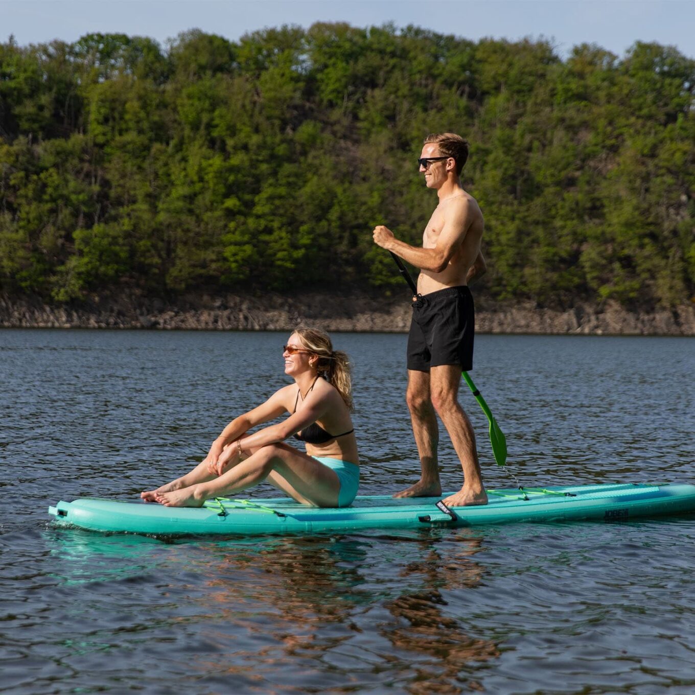 Two people on a Jobe Loa 11.6 Inflatable Paddle