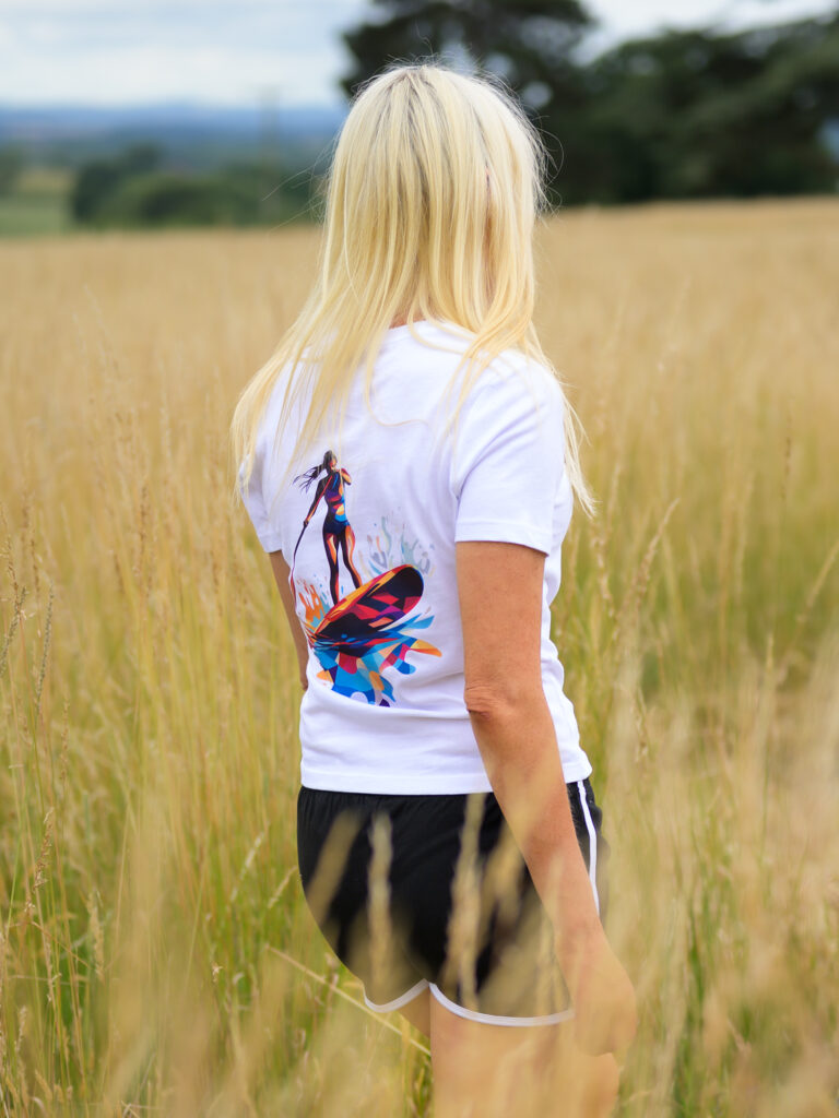 Model wearing Ride The Vibe Women's Paddleboard T-Shirt by SUP Funk