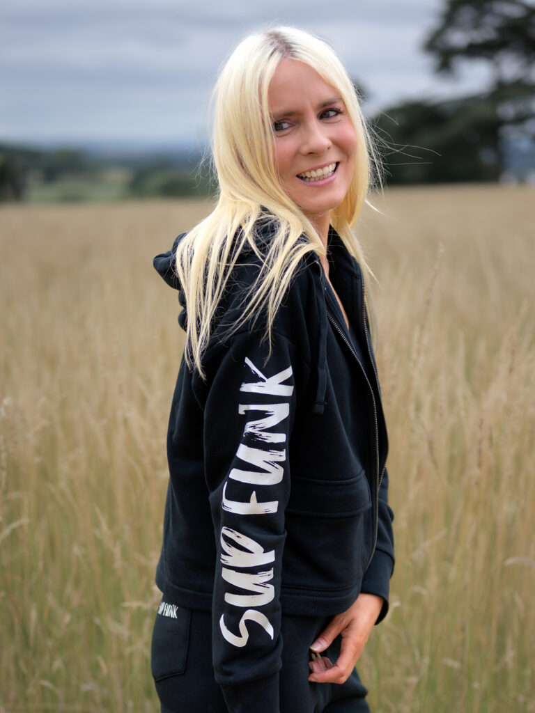Women wearing Signature Luxe Collection Zip Hoodie Jacked in black by SUP Funk