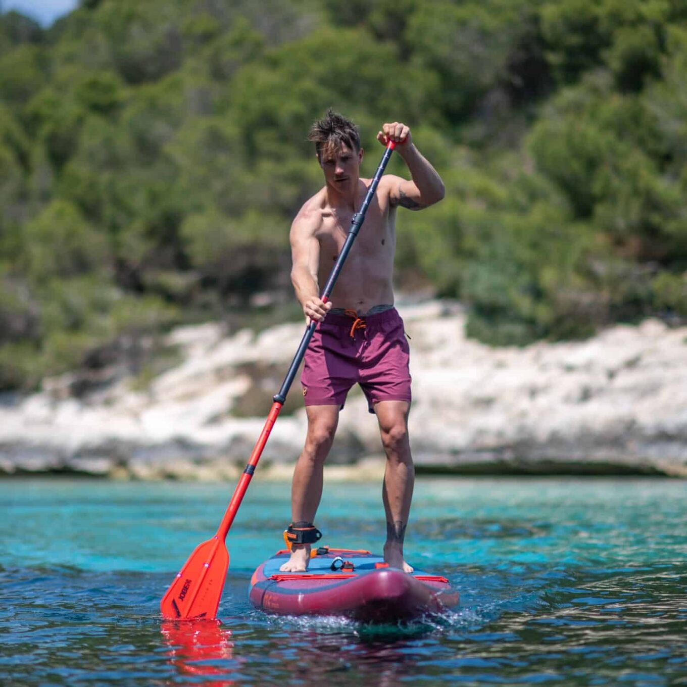 Jobe Stream Carbon 40 SUP Paddle 3 Piece in Orange Action shot