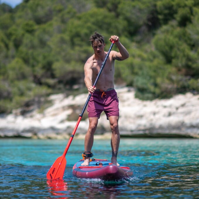 Jobe Stream Carbon 40 SUP Paddle 3 Piece in Orange Action shot