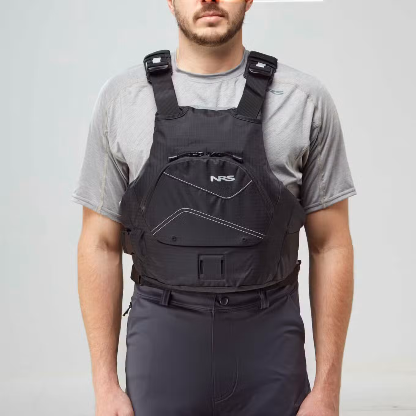 Model wearing NRS Ion PFD Black Buoyancy Aid Front View