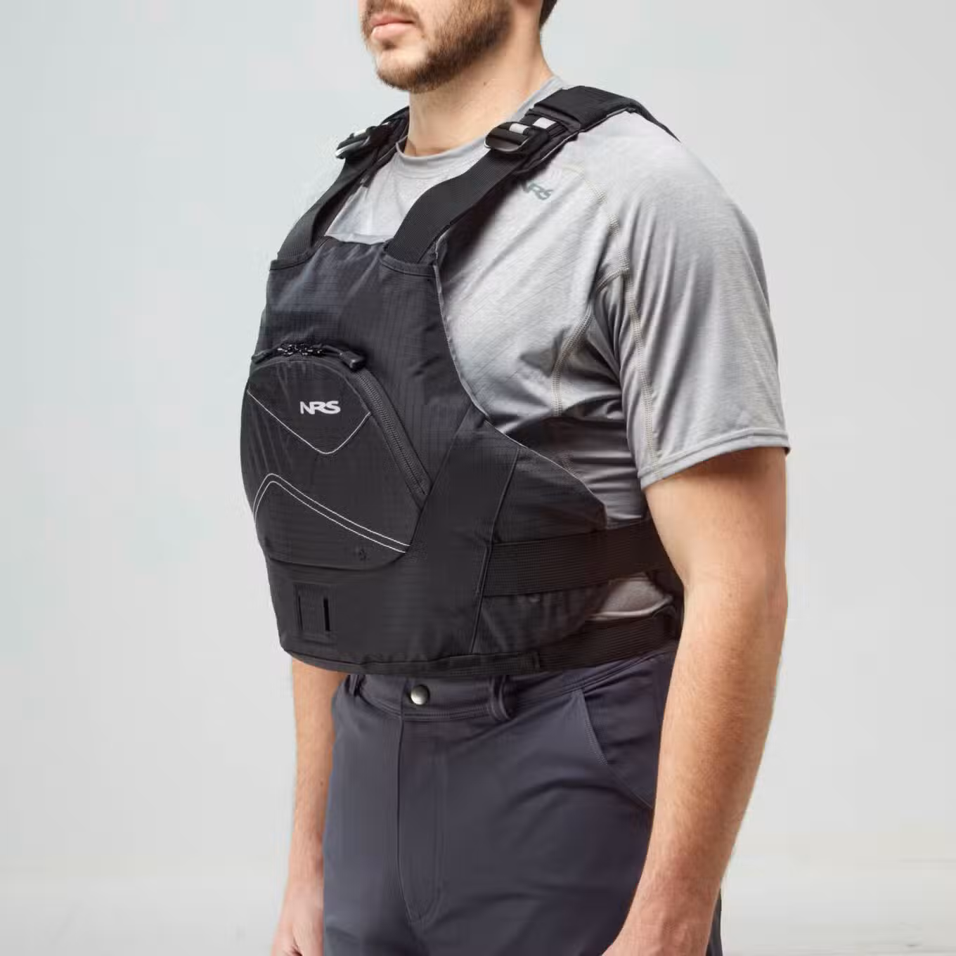 Model wearing NRS Ion PFD Black Buoyancy Aid Left View