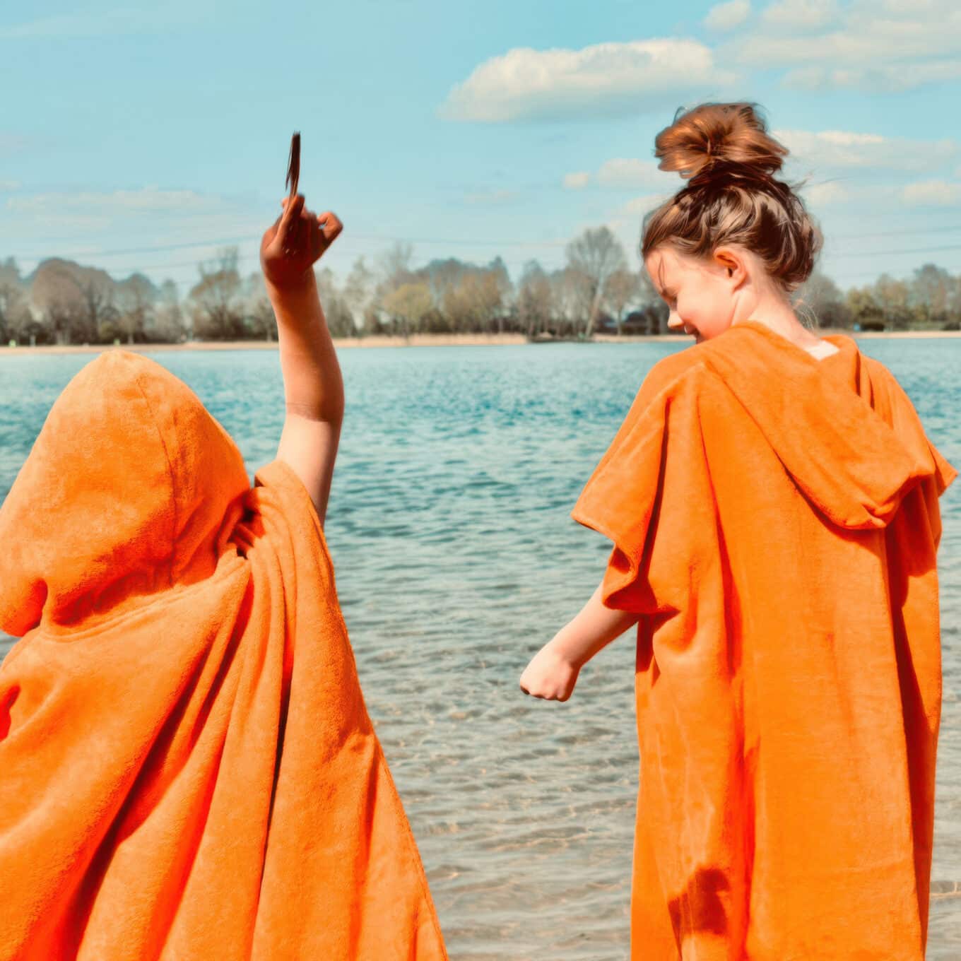 MOAI Kids Cotton Towelling Robe Orange Action Shot 2