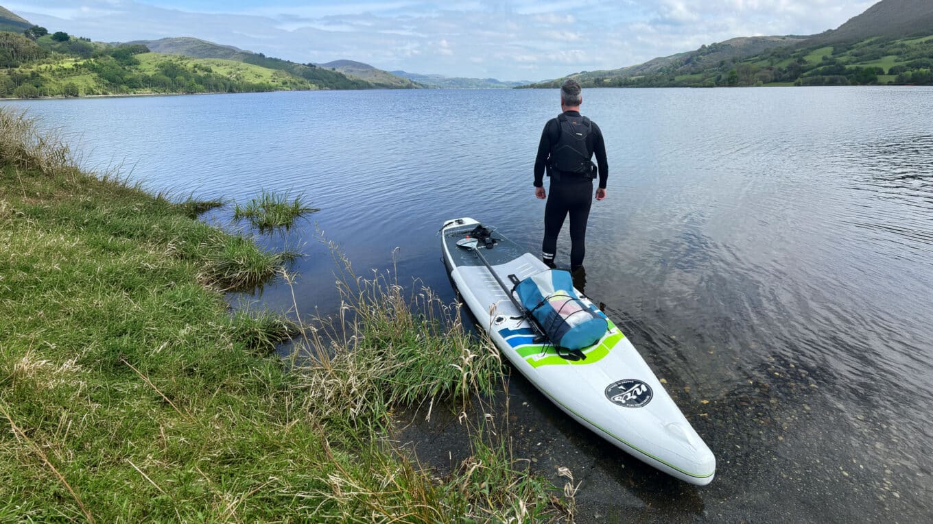 Nigel and his Touring Board at a large lake