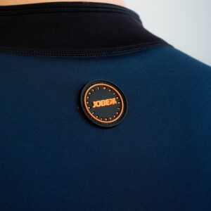 Close-up of the rear Jobe badge and flatlock seam on the Toronto 2mm men’s neoprene jacket