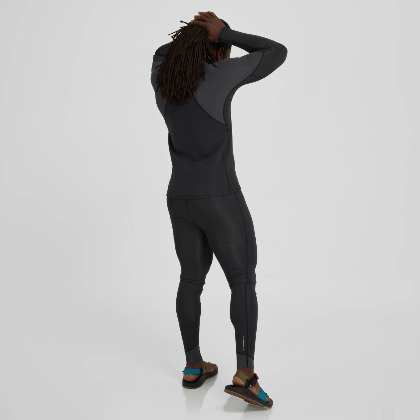 Rear view of a model wearing the NRS Men’s HydroSkin 1.5mm Neoprene Jacket