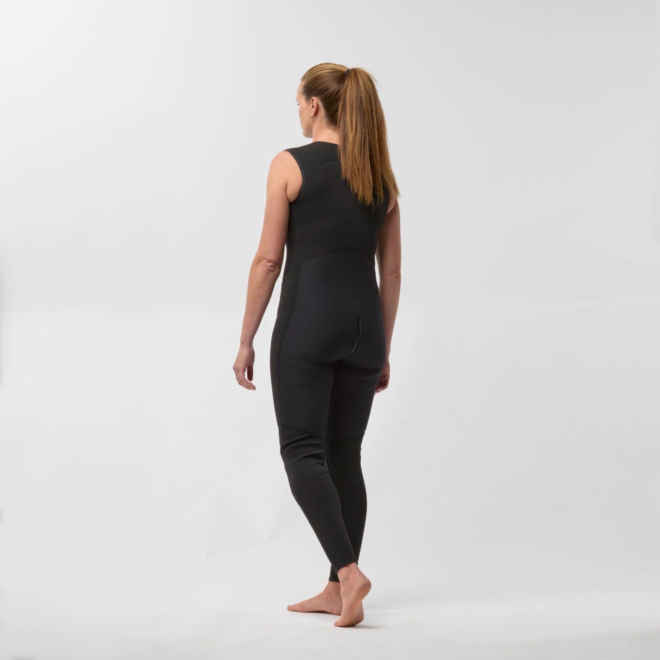 Rear view of a model wearing the NRS Women’s 3.0 Ultra Jane Wetsuit