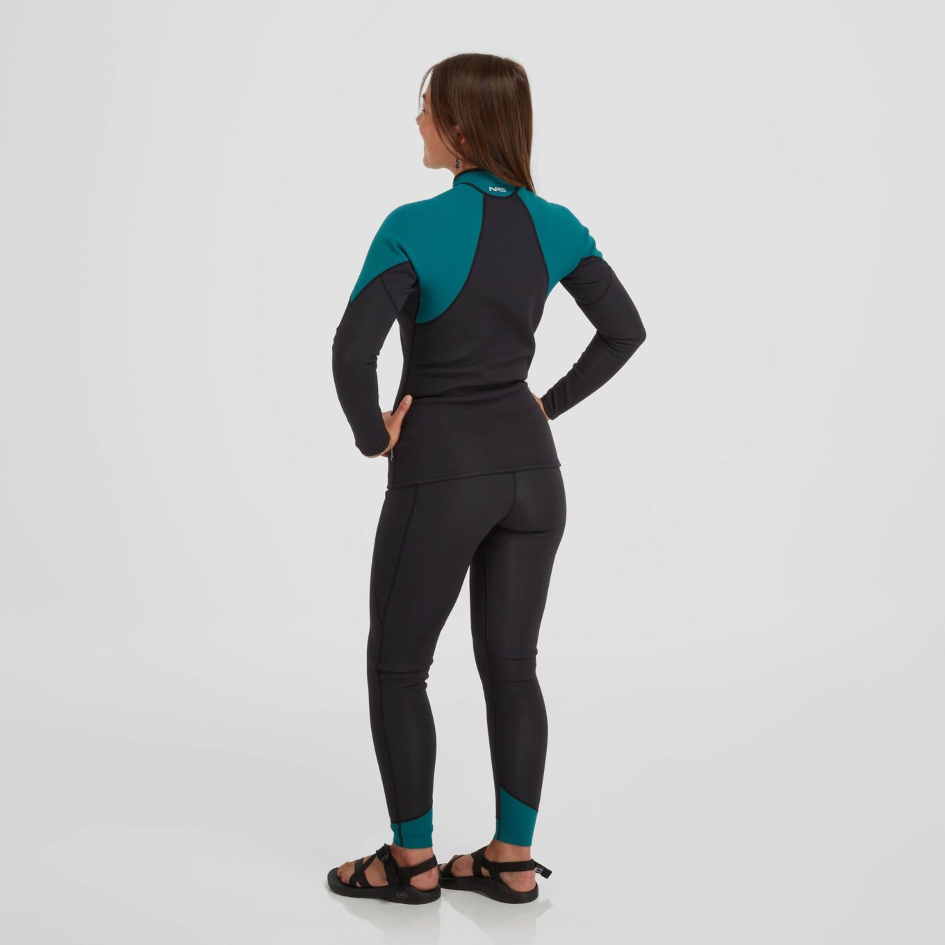 Rear view of a model wearing the NRS Women’s HydroSkin 1.5mm Neoprene Jacket