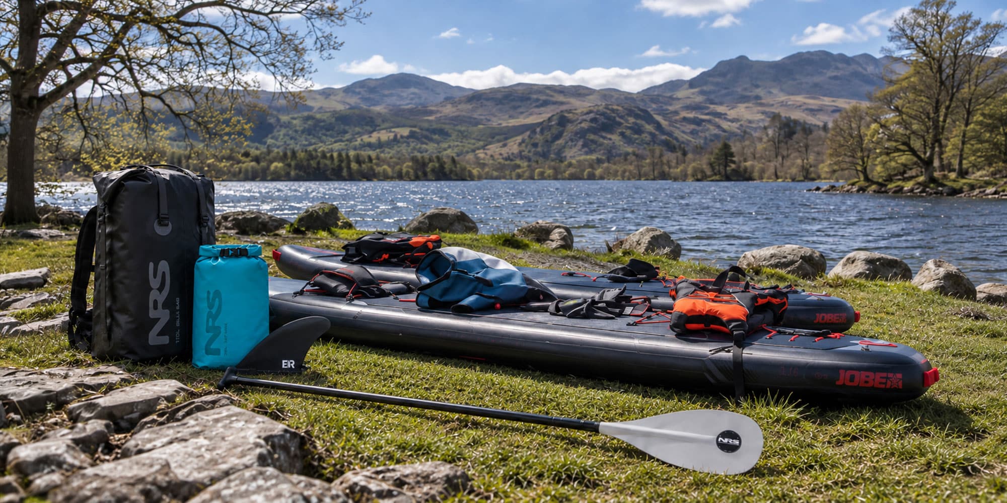 Paddleboarding equipment and accessories from specialist brands beside a UK lake