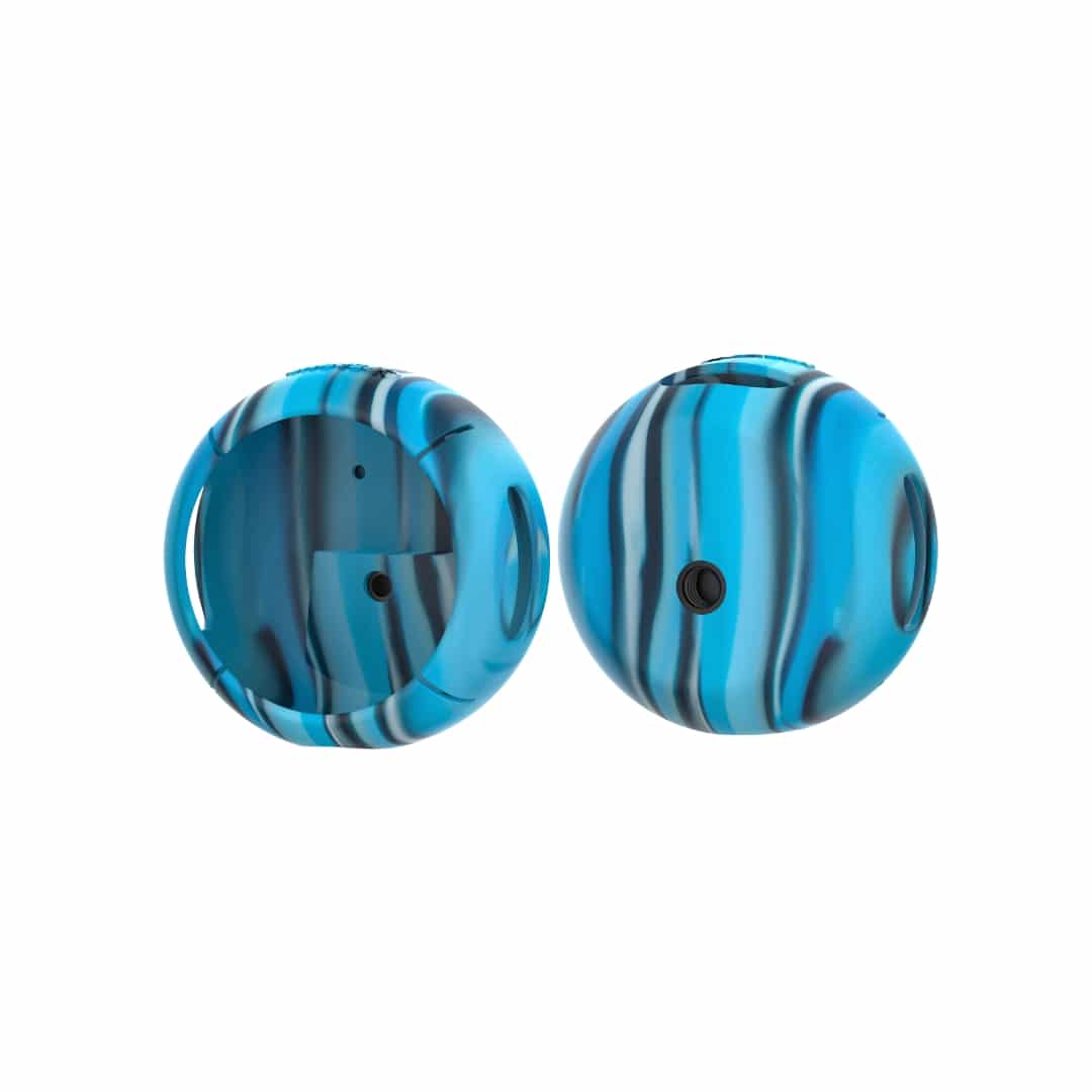 Cruiser H2.0 speaker fitted with a Tidal Blue Speaqua Shell cover against a flying dirt and rock background
